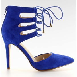 Tacones de aguja de ante atados en un tobillo de cobalto azul
