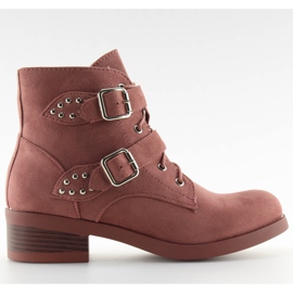 Botas con cordones y lazos rosas y rosas.