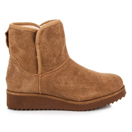 Coco Perla Mukluki en la plataforma marrón Coco Perla Mukluki en la plataforma marrón