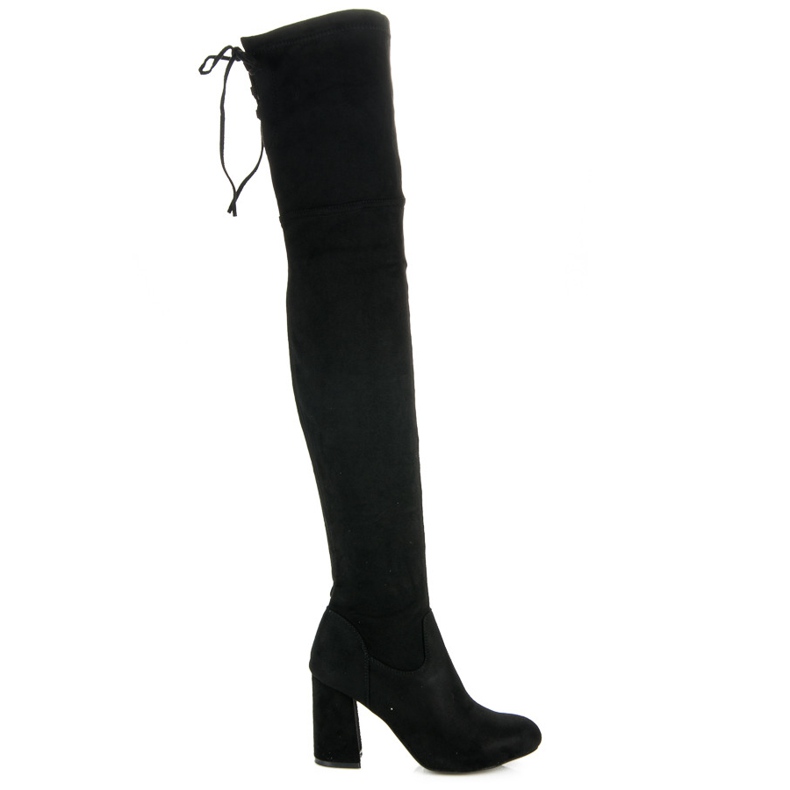 Botas negras hasta el muslo en un poste negro Botas negras hasta el muslo en un poste negro