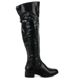 Botas negras por encima de la rodilla negro