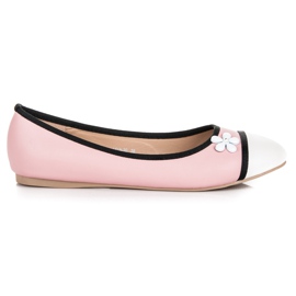 Vices Bailarina con una flor rosa