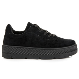 Zapatillas de gamuza en la plataforma negro