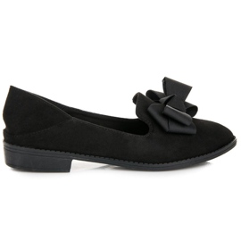 Ch. Creation Zapatos con lazo negro