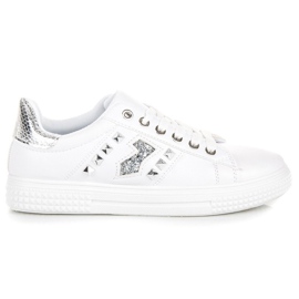 Zapatillas de deporte de moda en la encuadernación blanco