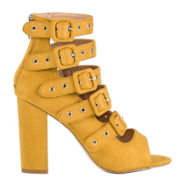 Vices Sandalias rockeras en el poste de vicios amarillo