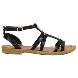 Sandalias planas negras con hebilla negro