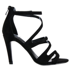 Sandalias de gamuza en un tacón alto negro Sandalias de gamuza en un tacón alto negro