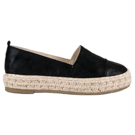 Alpargatas slip-on en la plataforma negro