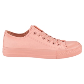 Zapatillas rosas en la unión rosado