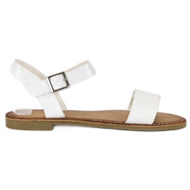 Comer elegantes sandalias blancas blanco