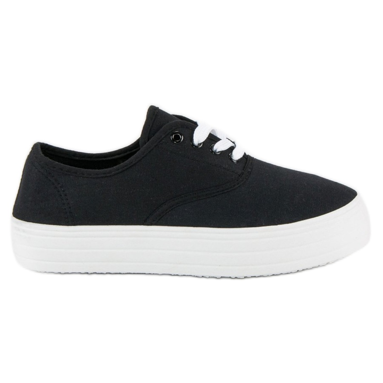 Zapatillas negras en la plataforma. negro