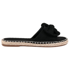 Chanclas alpargatas ante negro