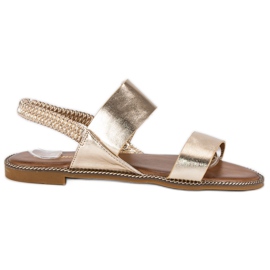 Renda Sandalias doradas con elástico dorado