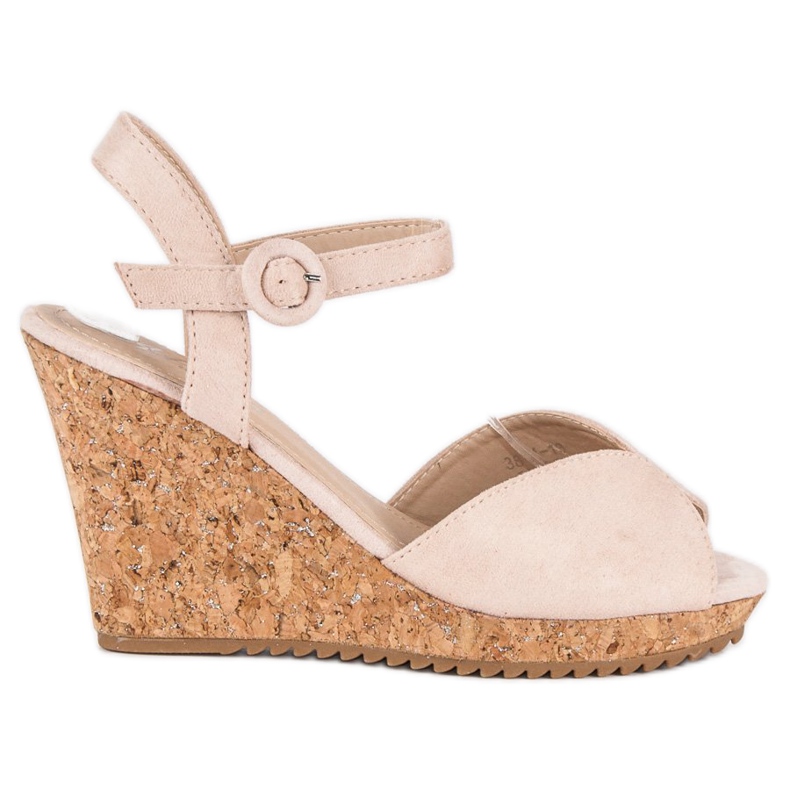 Sandalias en un tacón de cuña de corcho marrón