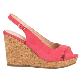 Super Mode Sandalias en un tacón de cuña de corcho rosado