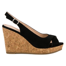 Super Mode Sandalias en un tacón de cuña de corcho negro