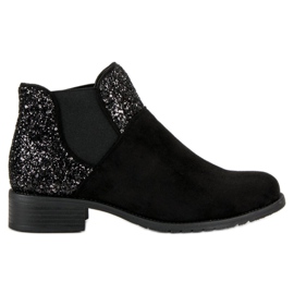 Botines de ante con tacón plano negro Botines de ante con tacón plano negro