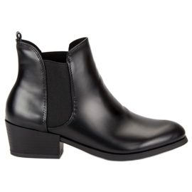 Corina Botines Chelsea negros con tacones altos