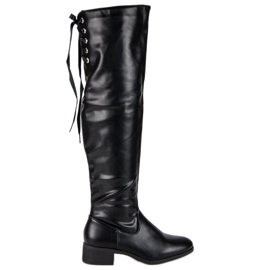 Botas negras por encima de la rodilla negro