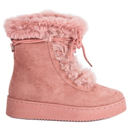 Botas de nieve atadas rosas