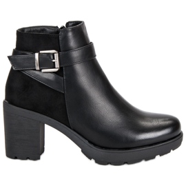 Anesia Paris Botines negros en un poste