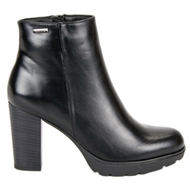 Weide Botines negros en el poste