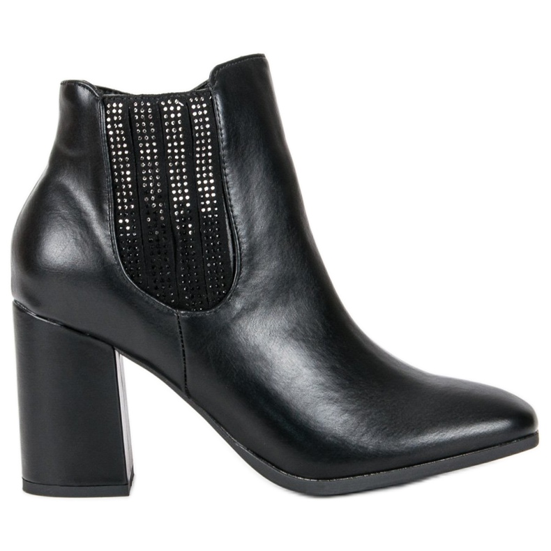 Kylie Botas elegantes en un poste negro