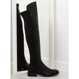 Botas negras por encima de la rodilla con parte superior flexible negro