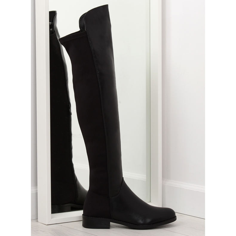 Botas negras por encima de la rodilla con parte superior flexible negro