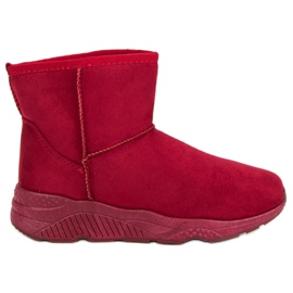 Botas de nieve en la plataforma rojo