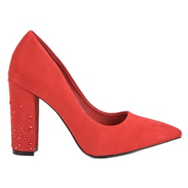 Bestelle Bombas rojas en un pilar rojo