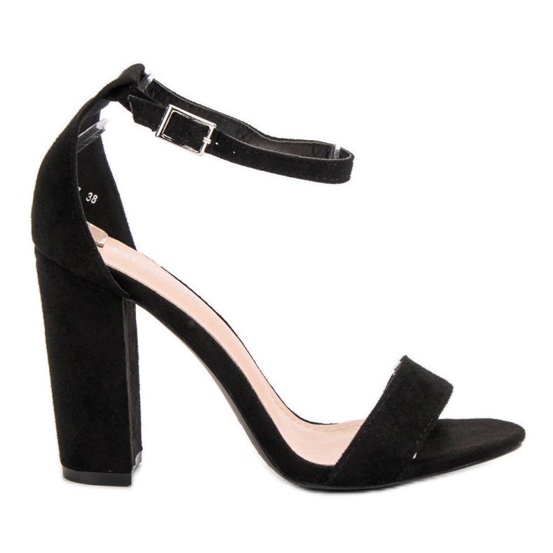 Ch. Creation Sandalias negras en una barra negro