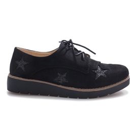 Mocasines negros con Big Stars