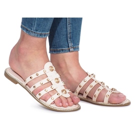 Zapatillas beige con tachuelas Rabelle