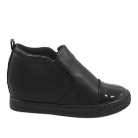 Zapatillas negras en la cuña DD409-1 negro