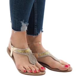 Chanclas doradas decoradas con B012 dorado