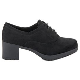 Primavera Botines con cordones en un poste negro