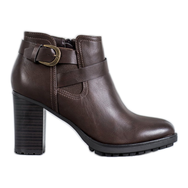 Super Mode Botas con estilo en un poste marrón