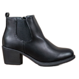 Anesia Paris Botines negros en un poste Anesia Paris Botines negros en un poste