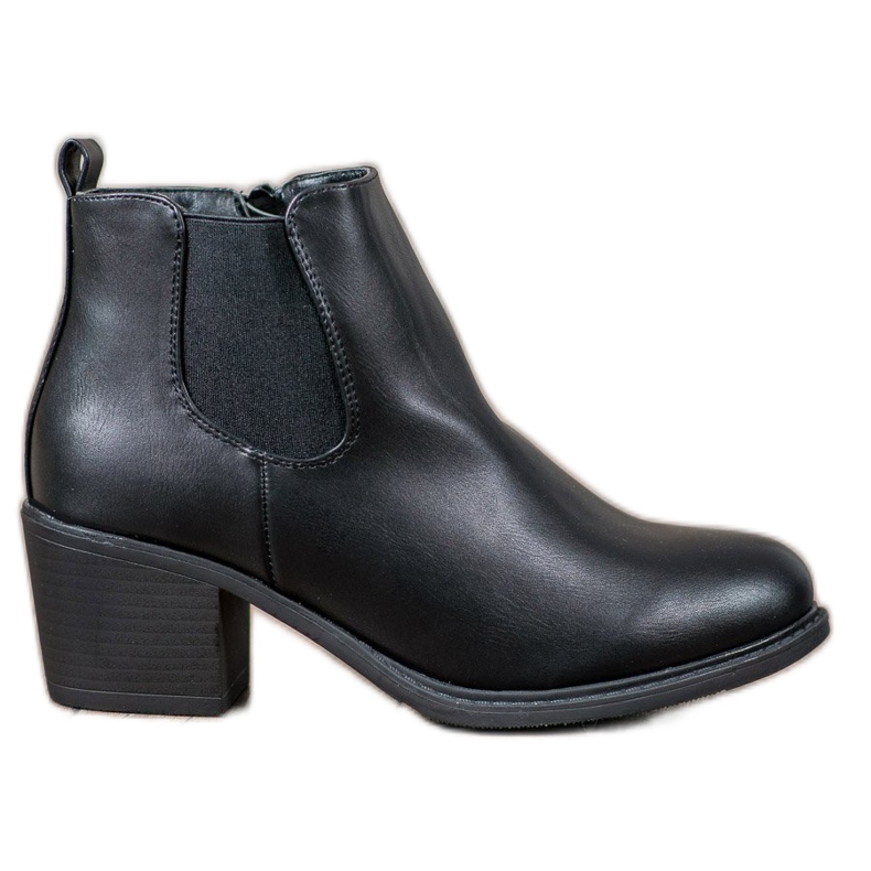 Anesia Paris Botines negros en un poste