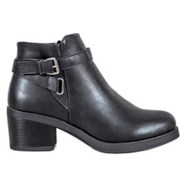 Anesia Paris Botas en un poste negro