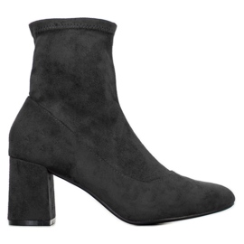 Diamantique Botines negros en un poste