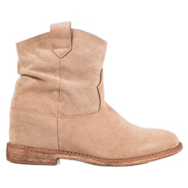 Bella Paris Botas de vaquero en una cuña multicolor