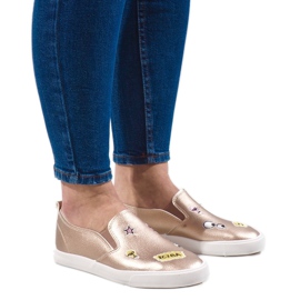 Deportivas doradas con estampados G82-5 dorado
