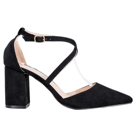 Diamantique Bombas en un pilar negro