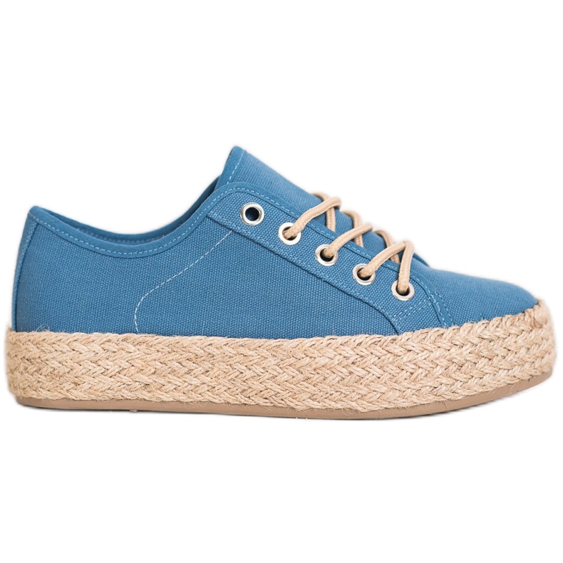 Kylie Zapatillas en una plataforma de paja azul