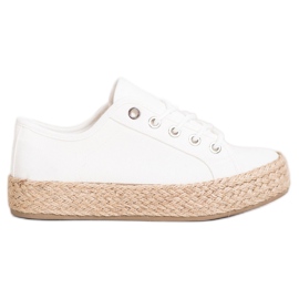 Kylie Zapatillas en una plataforma de paja blanco