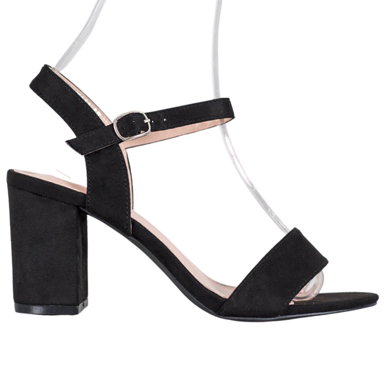 Nio Nio Sandalias en una barra negro