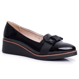 Vinceza Brogues de mujer sobre cuñas lacadas en negro Milona